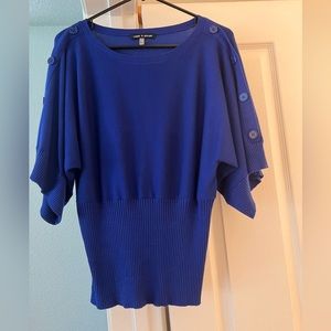 Blue Cable & Gauge sweater with button details on arms.